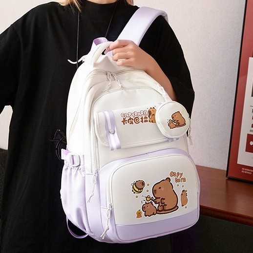 The new high-appearance-level ins fresh, sweet and cute Capibara backpack is a lightweight backpack for students in grades 3-6 full figure