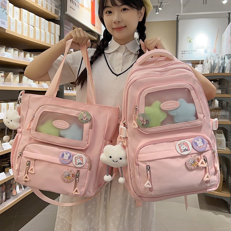 This is a fresh and cute backpack for children and primary school students in grades 3 to 6. It has a sweet style and a solid color with a transparent layer full figure