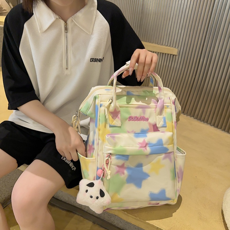A new, versatile and simple backpack for girls in grades three to six in Spring/Summer 2025. It is a large-capacity backpack for junior high school students details Picture