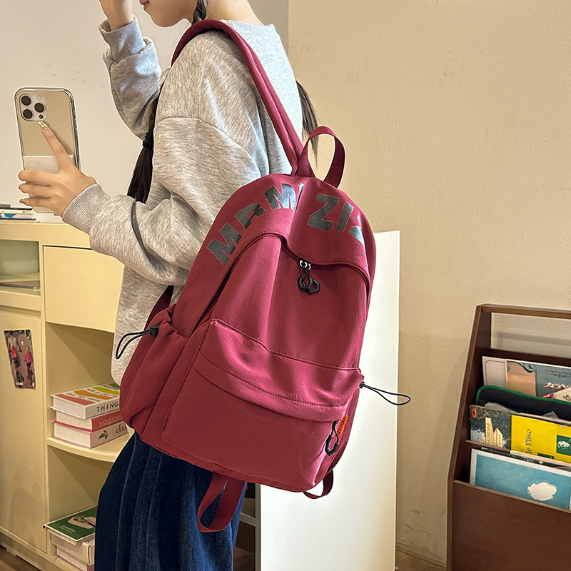 2025 New style simple letter backpack for middle school students, Japanese trendy brand college student couple travel backpack details Picture