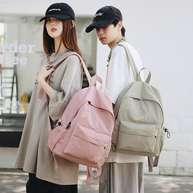 A new high-appearancelevel backpack from the Korean version of Instagram for high school and junior high school girls. It is a casual, simple and versatile large-capacity backpack for commuting details Picture
