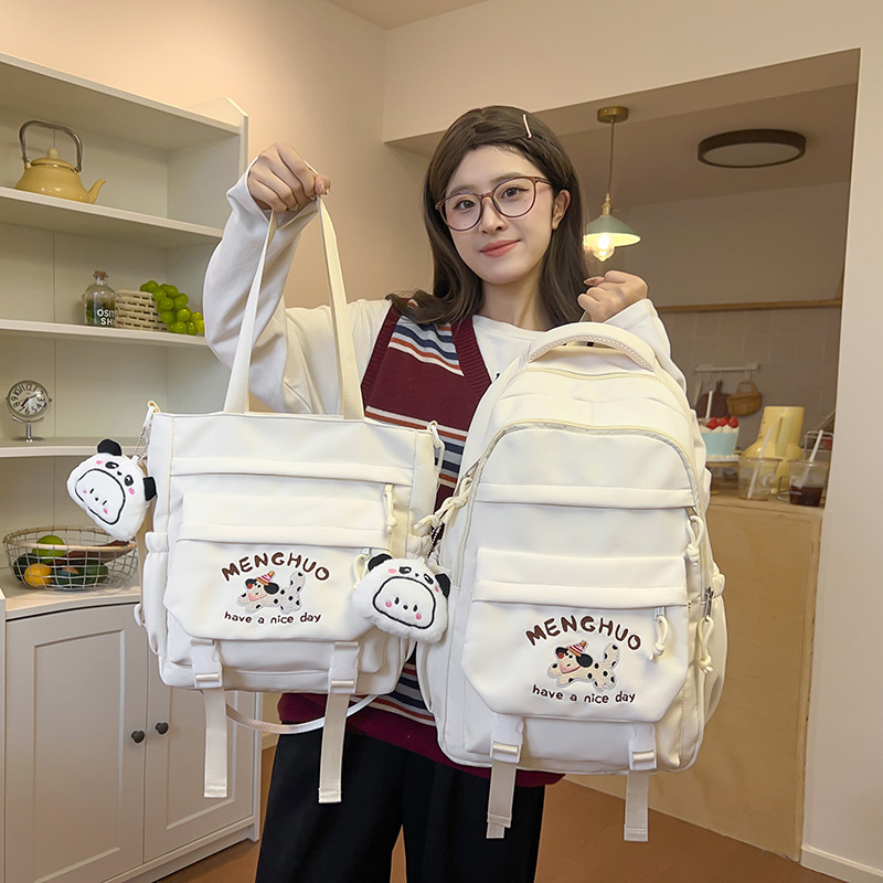 New ins college-style backpack for junior high school students, cute cartoon embroidered dog, two-piece backpack for primary school students full figure