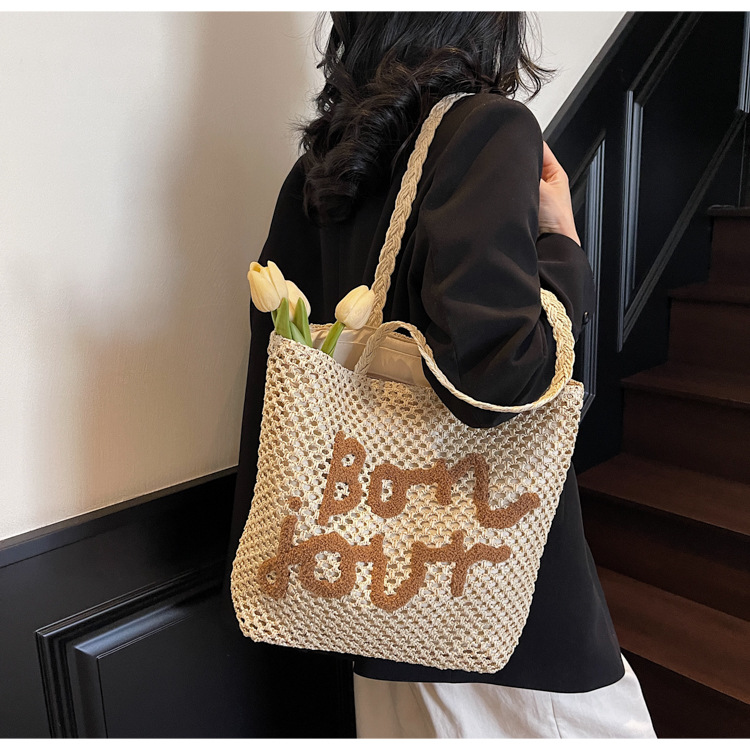 Letter-embroidered woven bag for women, Spring/Summer 2025 new vacation-style hollowed-out single-shoulder bag, fashionable and simple beach bag details Picture