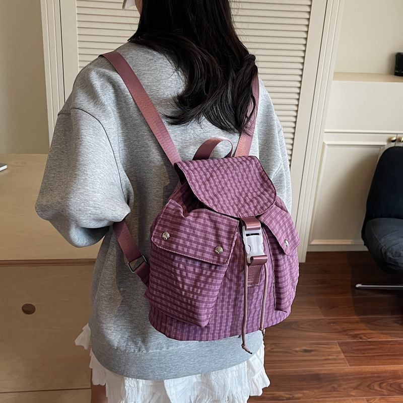 The new forest-themed ins high-appearance-level fresh checkered backpack is a lightweight and large-capacity backpack for women's mountain climbing and travel full figure