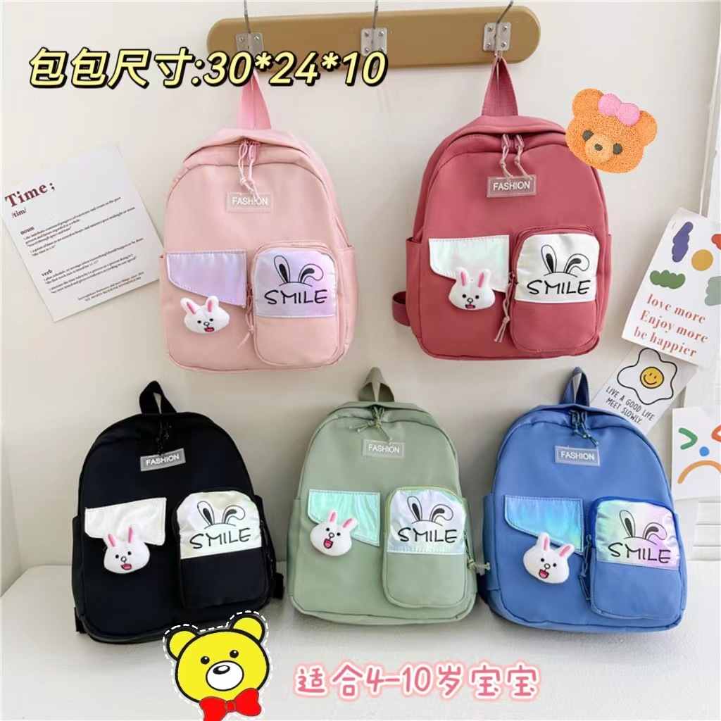The new cute rabbit backpack is a light and convenient bag for girls to go out and a versatile bag for boys and girls to reduce the burden full figure