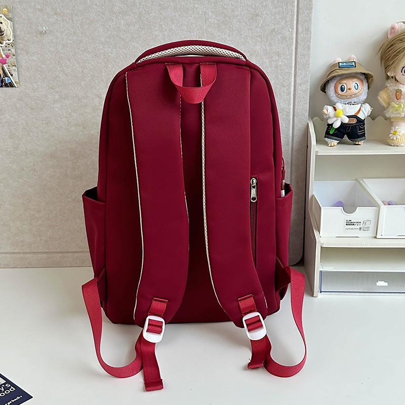 American-style simple color-blocking schoolbag, Korean version for girls, large-capacity backpack for high school students, versatile travel backpack for junior high school students Specification drawing