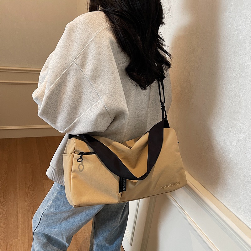 Men's travel bag, a lightweight hand-held luggage bag with a high-end feel. Women's large-capacity water-resistant sports single-shoulder bag details Picture