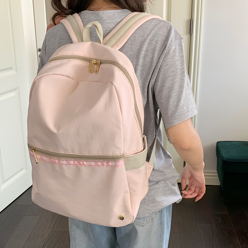 A simple and versatile Japanese Instagram-style casual and lightweight backpack for women. It's stylish and has a high level of appearance. It's a great backpack for best friends to travel and go shopping full figure