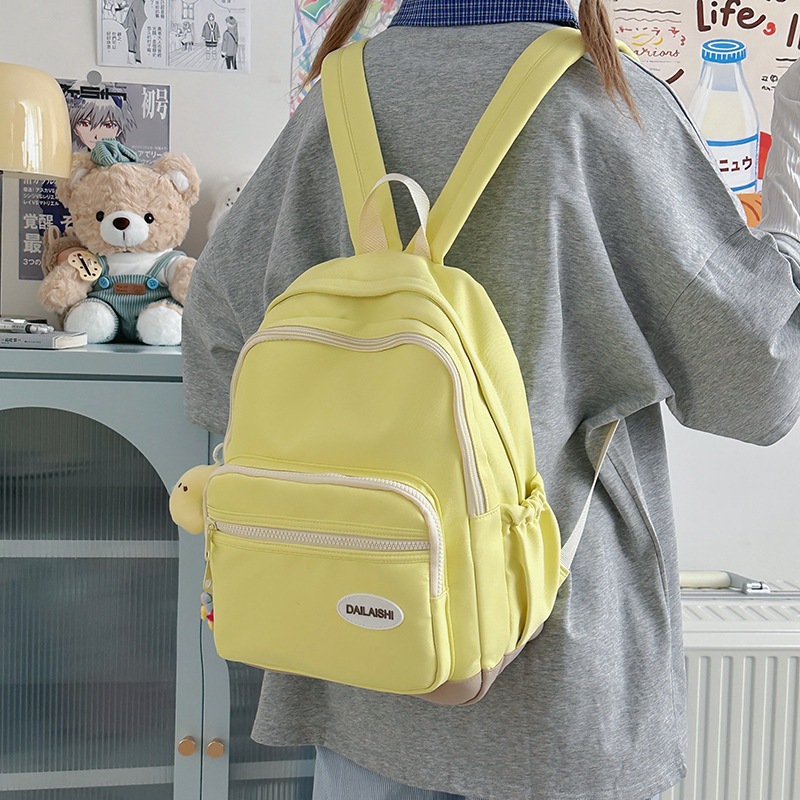 A new high-appearance-level Korean candy-colored fresh and sweet backpack, a lightweight and large-capacity backpack for junior and senior high school students to take extra classes details Picture