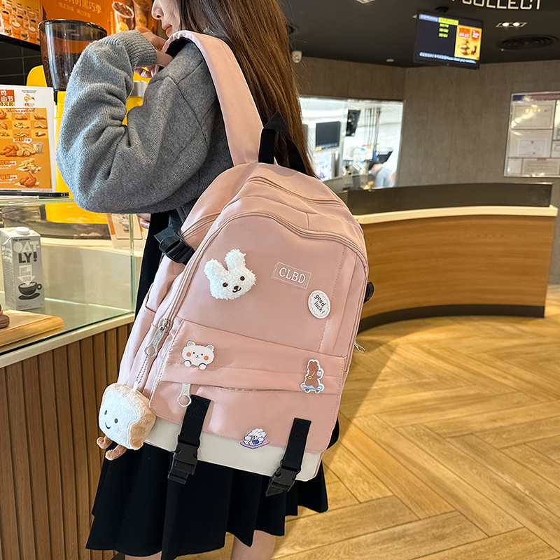 A new high-appeal, fresh and sweet backpack from the Korean version of Instagram. It's a lightweight and large-capacity backpack with contrasting colors for junior and senior high school students details Picture