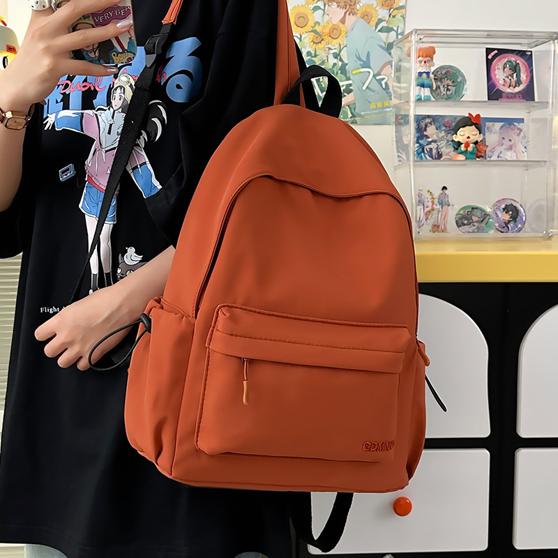 A new Korean-style backpack with a high level of appearance. It is a casual, simple, commuting, fashionable and versatile large-capacity backpack for middle and high school students details Picture