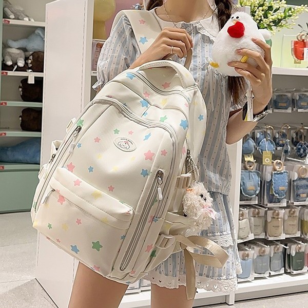 The new Japanese-style ins high-appearance-level fresh, sweet and cute star backpack is a large-capacity backpack for junior and senior high school students full figure