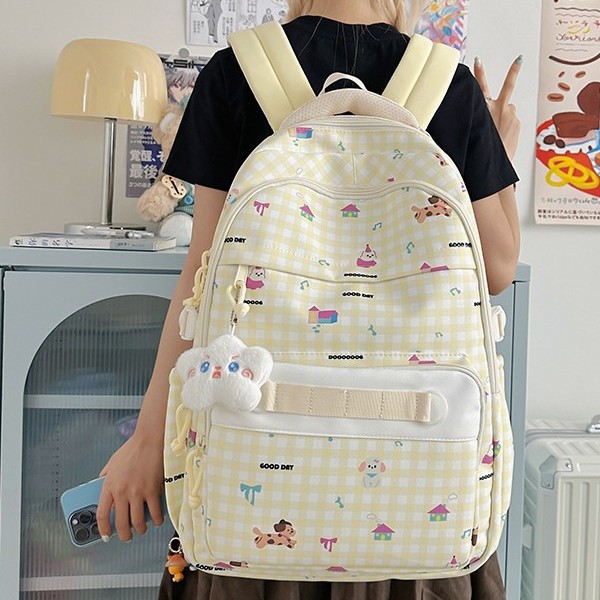 A new high-appearance-level Japanese ins fresh and sweet checkered cute cartoon backpack, a lightweight backpack for junior and senior high school students full figure