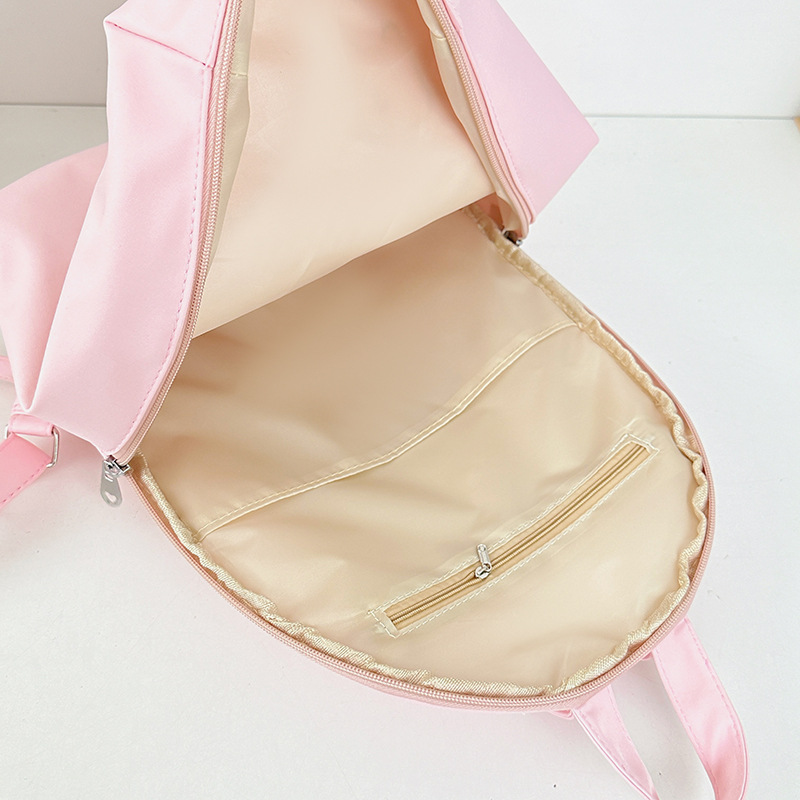 New cute cartoon girl backpack, high school girls' appearance level, cute cat graffiti children's spring outing and study tour small backpack Application Scenario