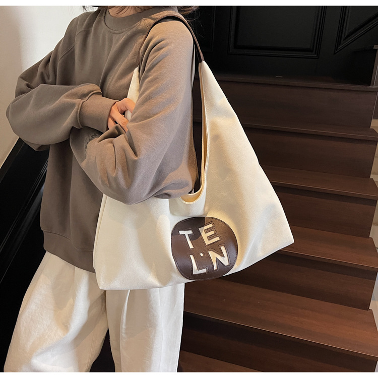 The 2025 new high-end, versatile, large-capacity tote bag, trendy, casual, commuting single-shoulder bag, and simple handbag details Picture