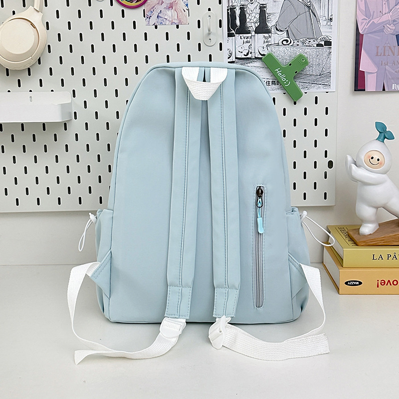 A new Korean-style backpack with a high level of appearance. It is a casual, simple, commuting, fashionable and versatile large-capacity backpack for middle and high school students Specification drawing