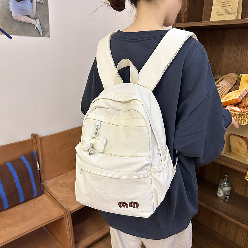 The new Instagram cute bow backpack is a niche and fresh schoolbag for junior and senior high school students and a lightweight travel backpack details Picture