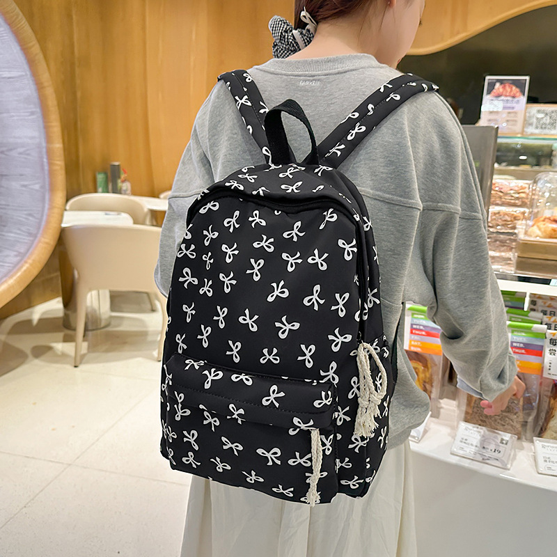 Large-capacity, high-appearance-level backpack with a bow for junior high school, 2025 new style ins fresh college backpack and schoolbag Specification drawing