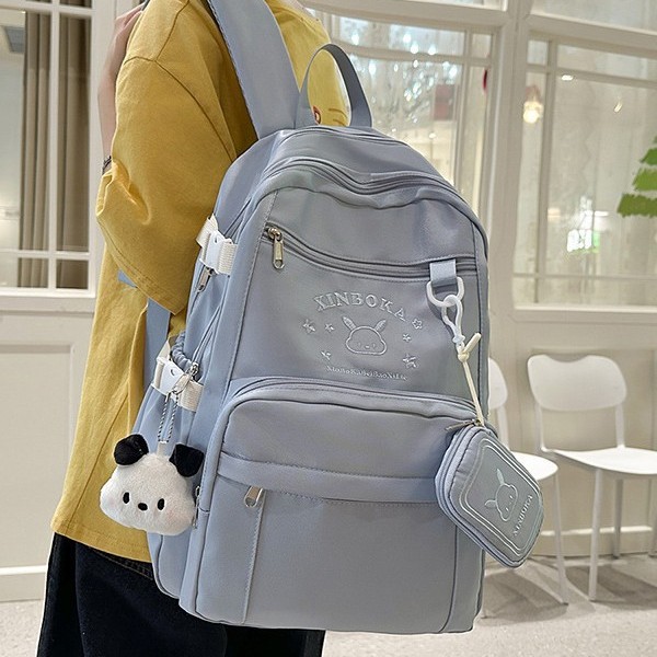 The new high-appearancelevel printed cute rabbit backpack is a casual, simple, lightweight and versatile backpack for high school and junior high school students, suitable for commuting details Picture