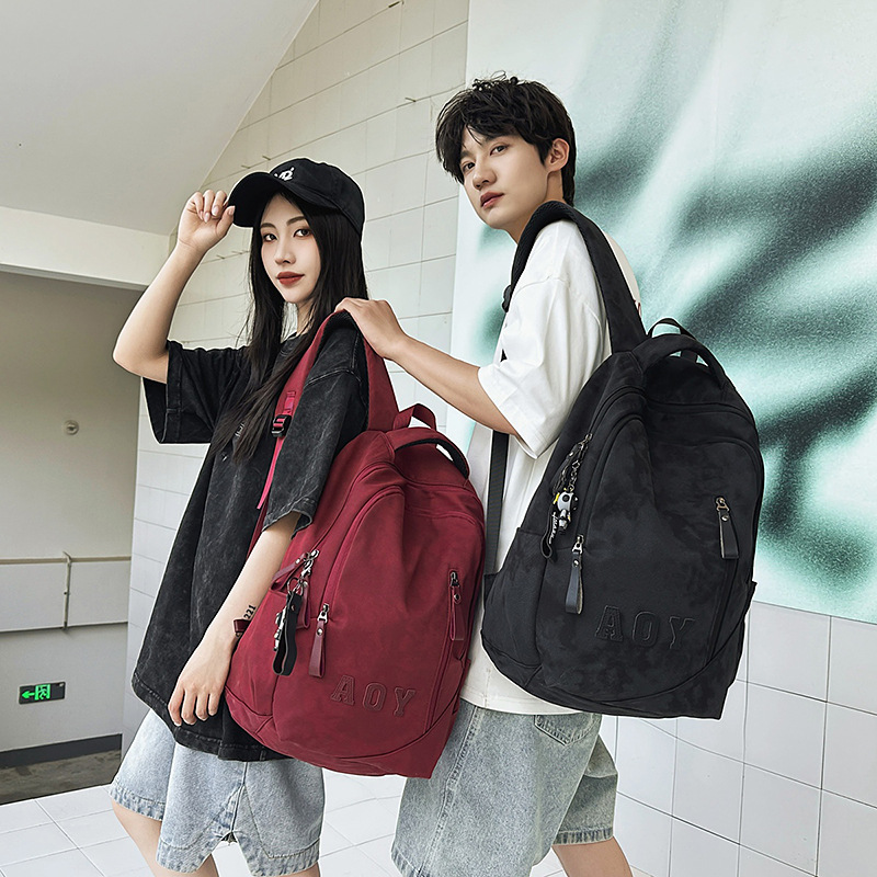 A new high-quality, niche dark-patterned gradient color schoolbag for junior and senior high school students, a lightweight and versatile casual outdoor backpack details Picture