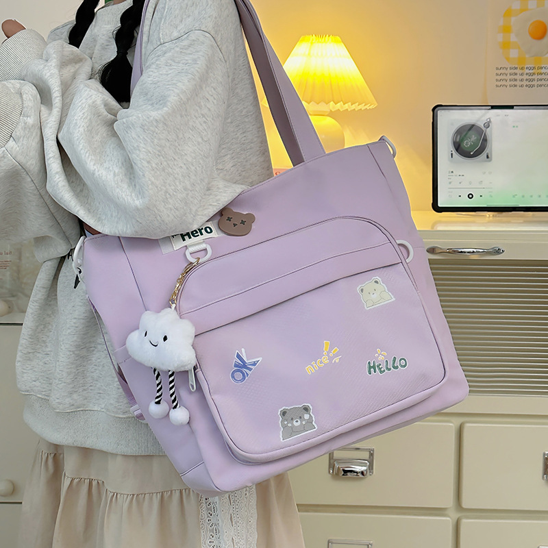 2025 New Korean version large-capacity tutorial bag, primary school single-shoulder bag, handbag, tutorial bag, crossbody art schoolbag details Picture