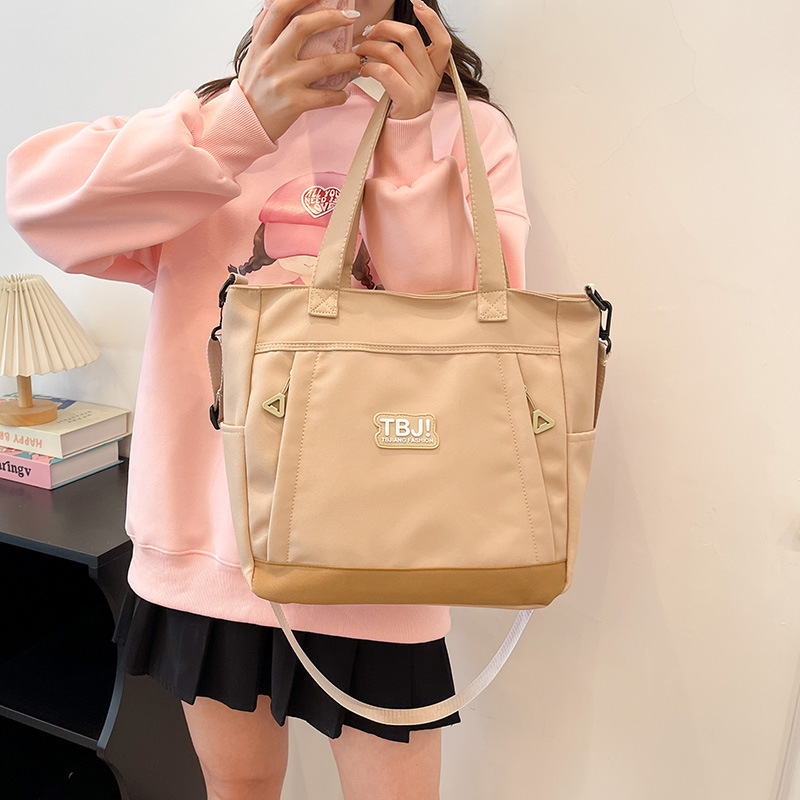 A simple and versatile single-shoulder student class bag for women in the spring of 2025, featuring a fresh and casual style with a large capacity details Picture