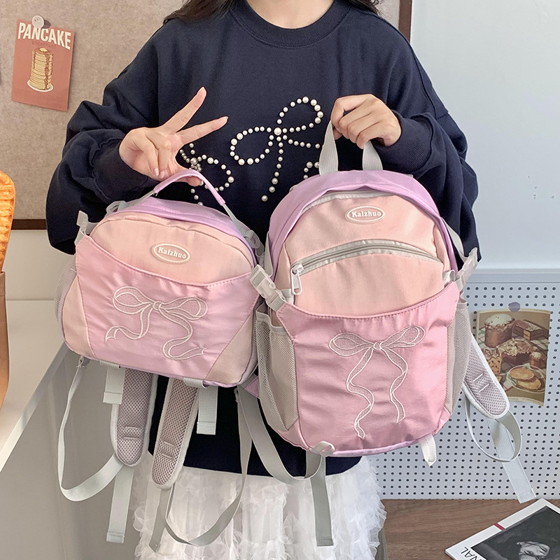 Backpack for women's travel, light and high appearance level, Instagram niche Korean girl bow schoolbag, dopamine small backpack full figure