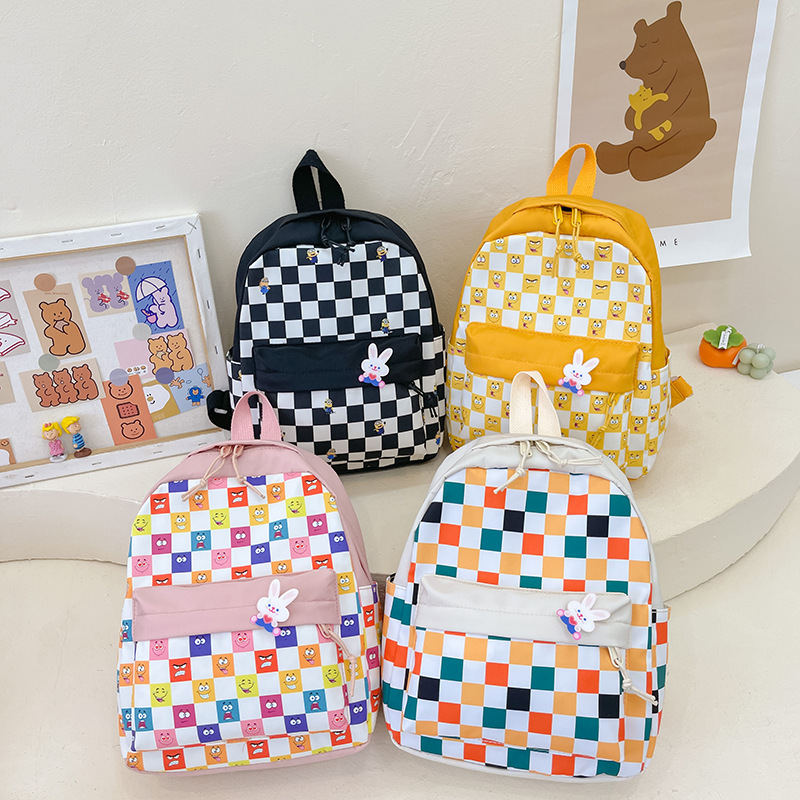 New Korean-style kindergarten backpacks for boys and girls, fashionable color-blocking checkered double-shoulder backpacks for large, medium and small classes full figure