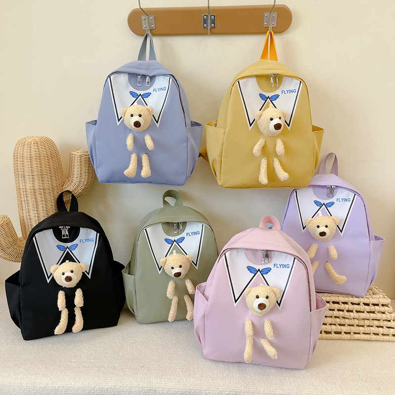 Fashionable backpack, simple children's schoolbag, super cute for boys and girls, Festival bear cartoon and adorable backpack full figure