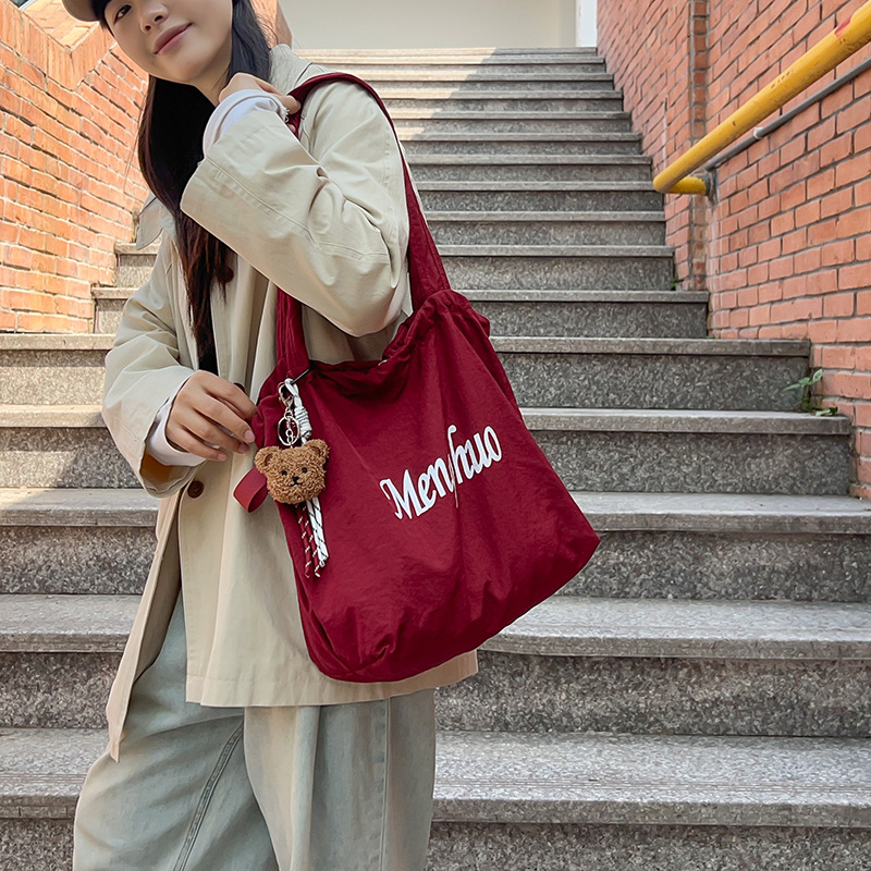 2024 New drawstring nylon single-shoulder bag, a lightweight Japanese commuter tote bag with large capacity and versatility details Picture