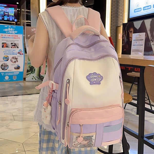 A new Japanese-style ins backpack with a high level of appearance, fresh and sweet, featuring a color-blocking and color-blocking design. It is a lightweight backpack for junior and senior high school students full figure