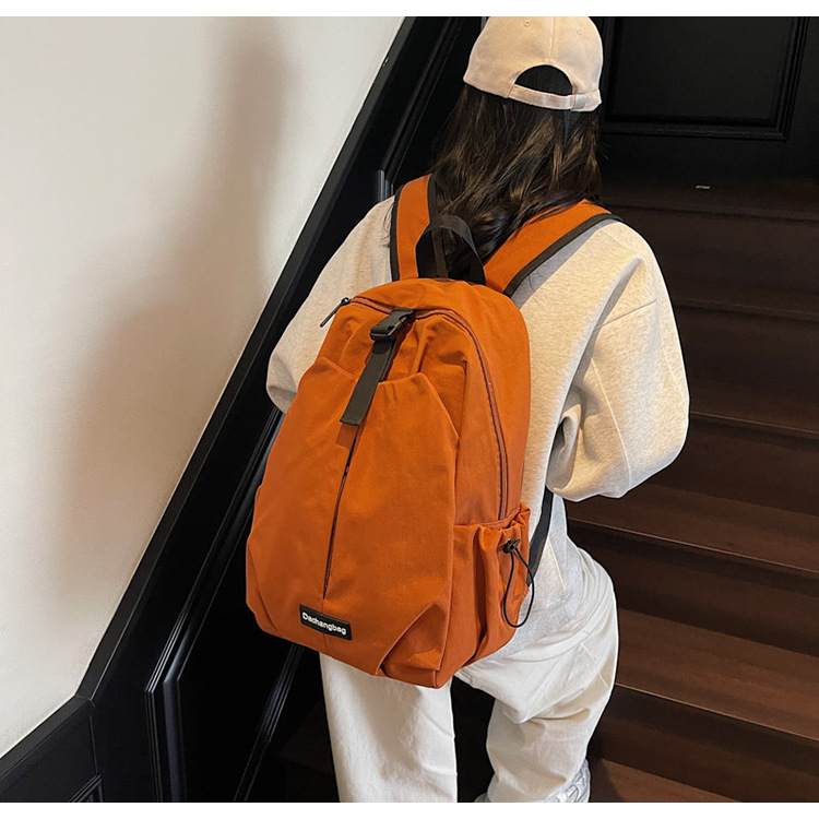 Lightweight backpack for college students, large-capacity, simple, fashionable and versatile travel bag, daily casual commuting backpack full figure