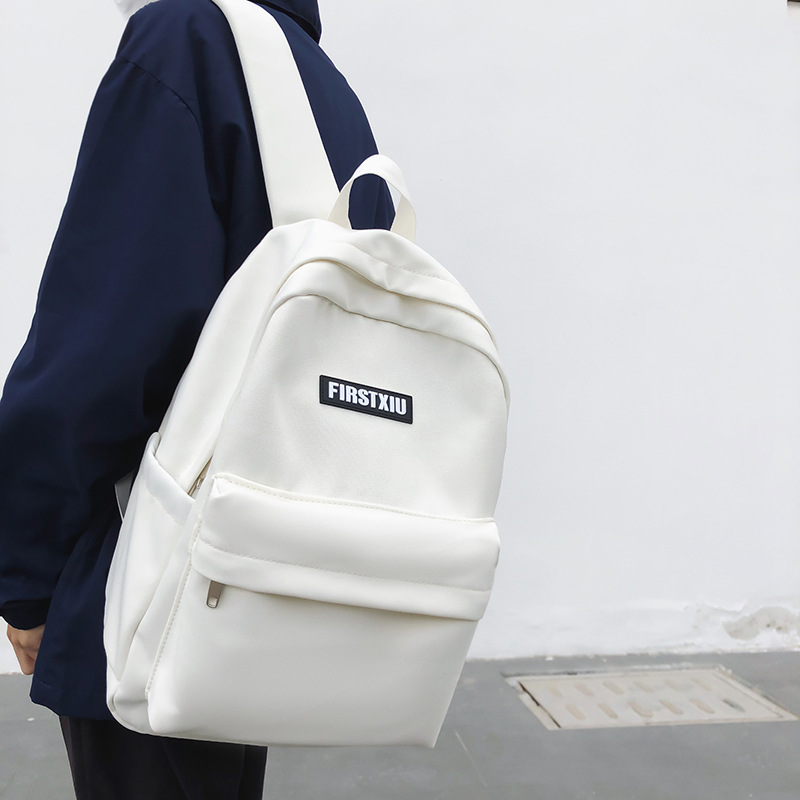 Schoolbag for girls, junior high school, senior high school and college students, solid color simple style backpack, 2023 new Korean version lightweight and niche backpack details Picture