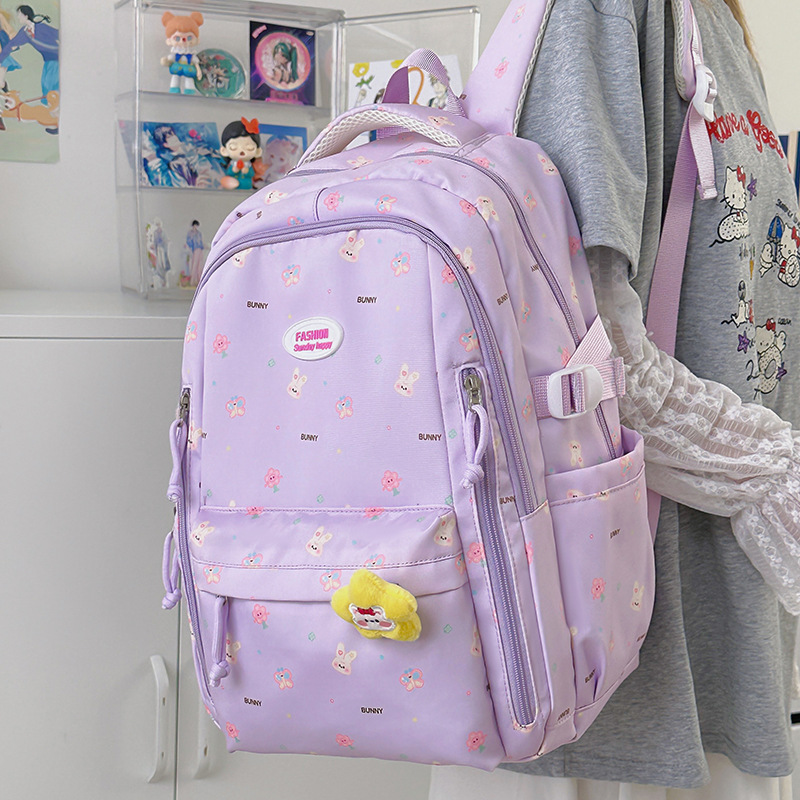 The ins Japanese-style cartoon schoolbag has a high appearance level and is cute. It is a large-capacity backpack for junior and senior high school girls and for students in grades 4 to 6 full figure