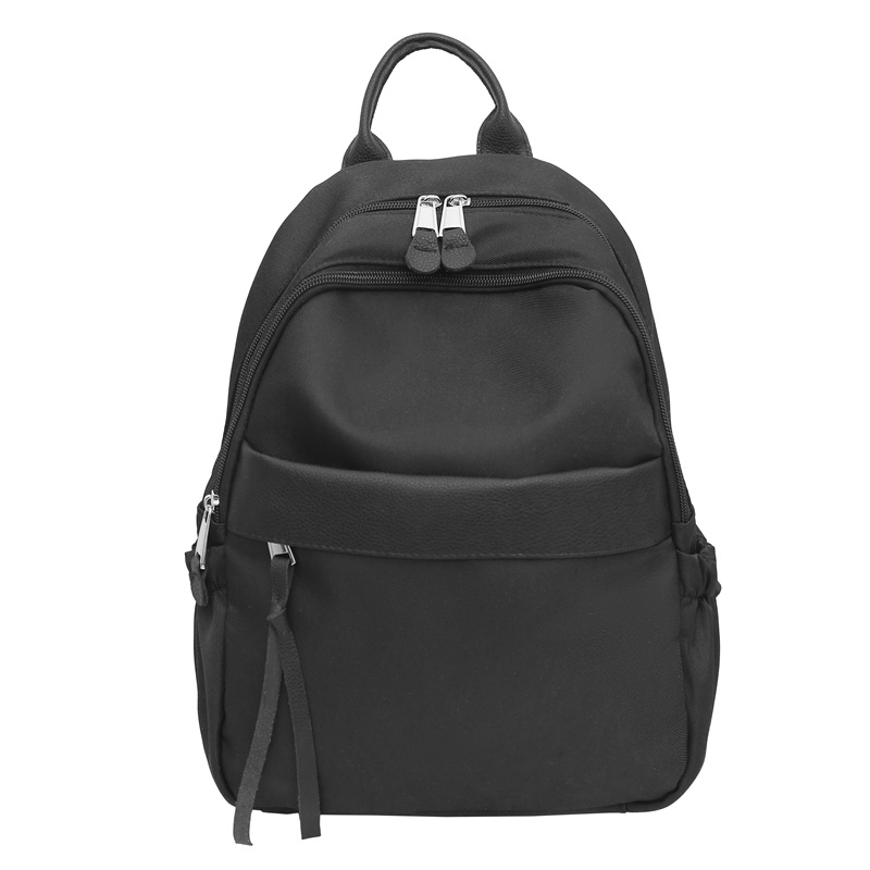 Solid-colored female college student's simple travel backpack, lightweight small backpack, leisure travel bag, travel bag, study bag Item Picture