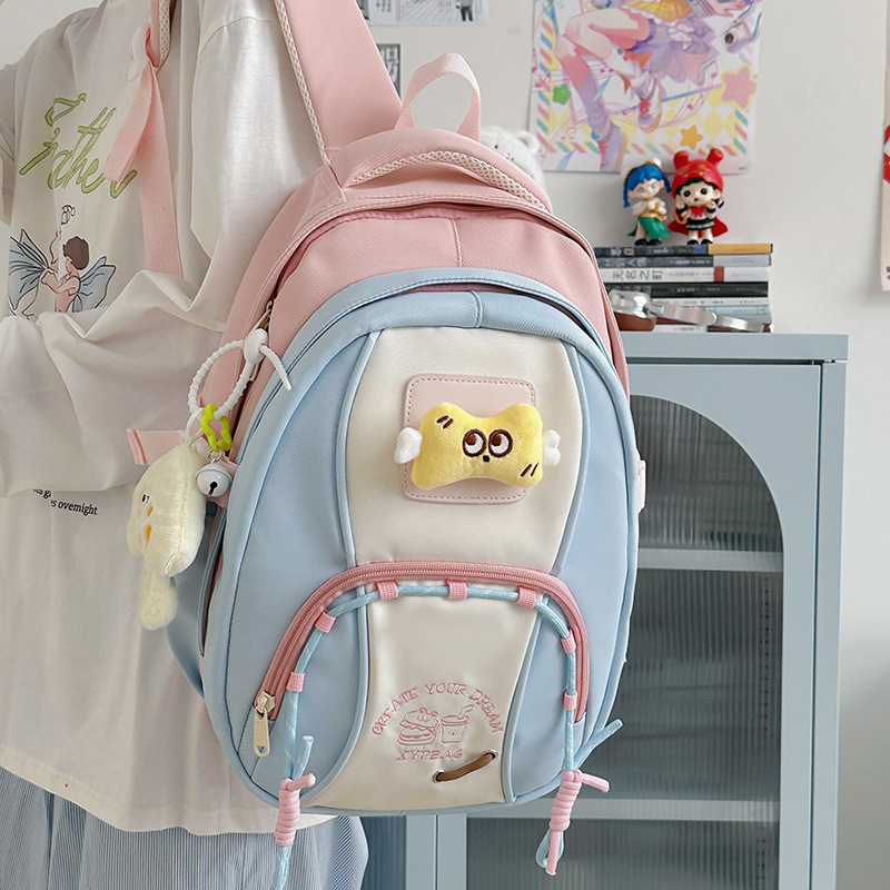 A new high-appeal, fresh and sweet color-blocking backpack from Korean Instagram, a light backpack for junior and senior high school students' outings full figure