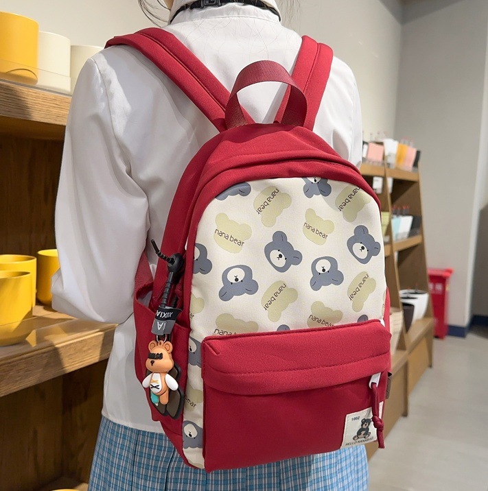 Korean-style schoolbag, versatile for girls, large-capacity and cute backpack, lightweight and stress-reducing school backpack for primary school students in grades 3 to 6 full figure
