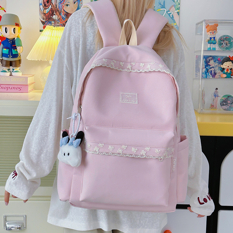 A new Japanese-style backpack with a high level of appearance, fresh and sweet candy color, is a casual and simple large-capacity backpack for primary and secondary school students full figure
