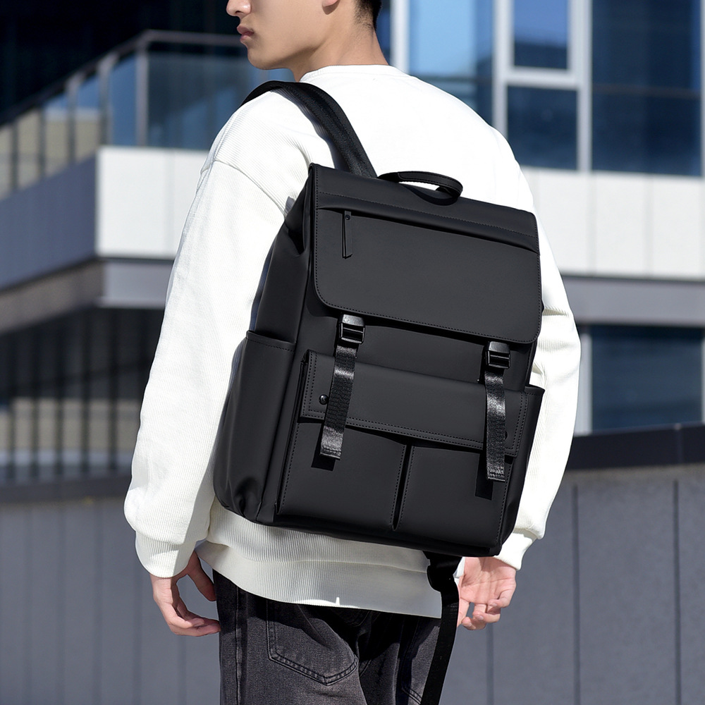 The new cross-border backpack is suitable for both men and women, featuring a high level of appearance. It is a flip-top casual backpack for commuting Specification drawing