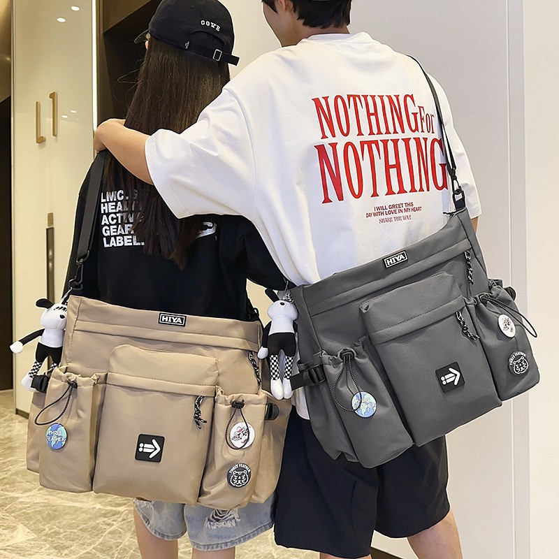 A new Japanese-style, stylish, multi-purpose, trendy crossbody bag for couples, casual, simple, lightweight and versatile, with a large capacity full figure