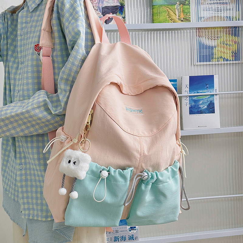 A new high-appeal, fresh and sweet backpack from Korean Instagram, featuring contrasting colors, multiple pockets and large capacity for junior and senior high school students details Picture