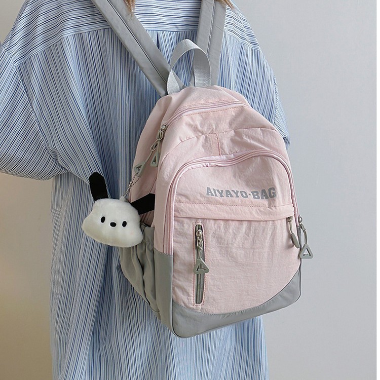 A new high-appearance-level letter-style backpack for junior and senior high school students, which is casual, simple, lightweight, versatile for commuting and has a large capacity details Picture