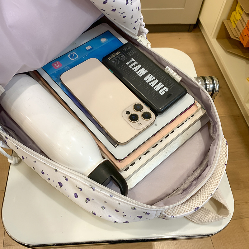 A new high-appeal, fresh and sweet floral backpack from Korean Instagram, a simple and large-capacity backpack for junior and senior high school students Application Scenario
