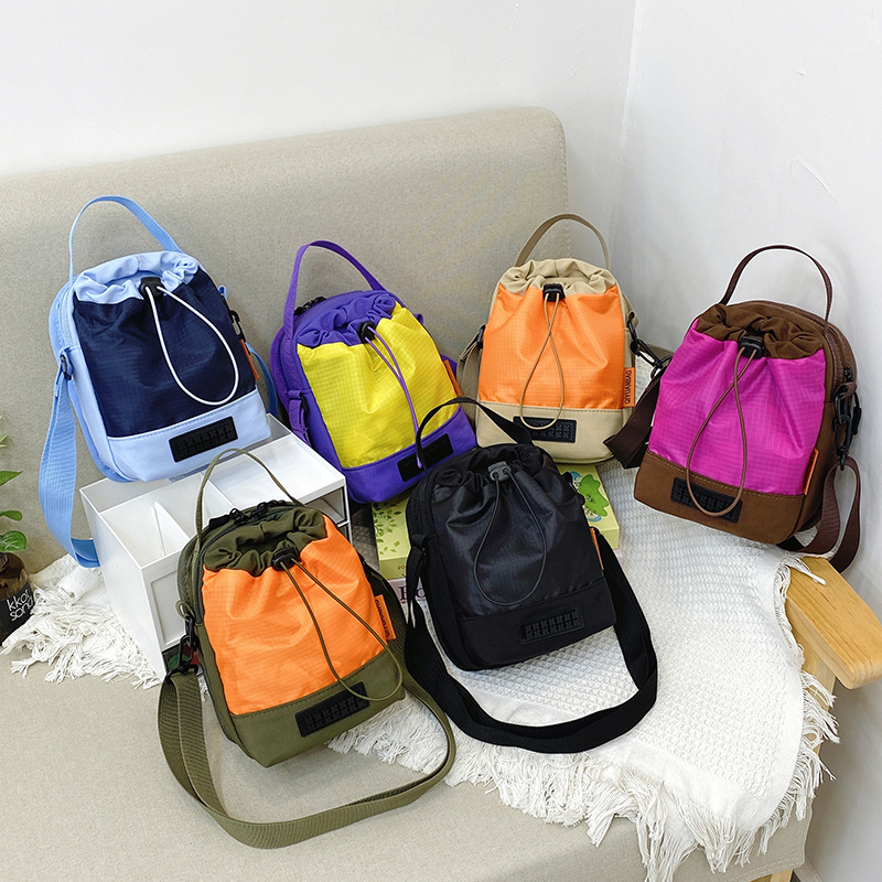 Cute color-blocking water cup bag, large-capacity multi-layer lightweight travel mom bag, single-shoulder crossbody bag, bucket bag, clutch bag Specification drawing