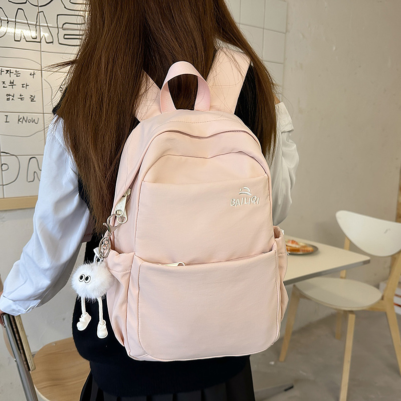 Korean-style ins campus simple junior high school solid color schoolbag, high appearance level backpack, large capacity, versatile and lightweight single-shoulder bag full figure