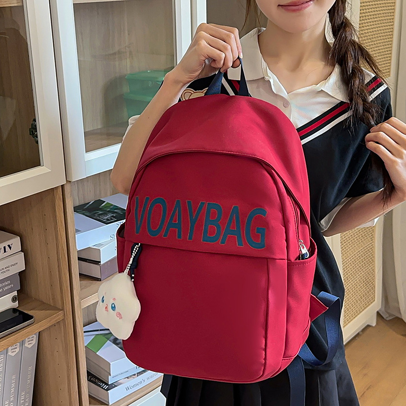A new high-appearance-level letter-style school-style backpack for junior and senior high school students, featuring a casual, simple and large-capacity travel design full figure