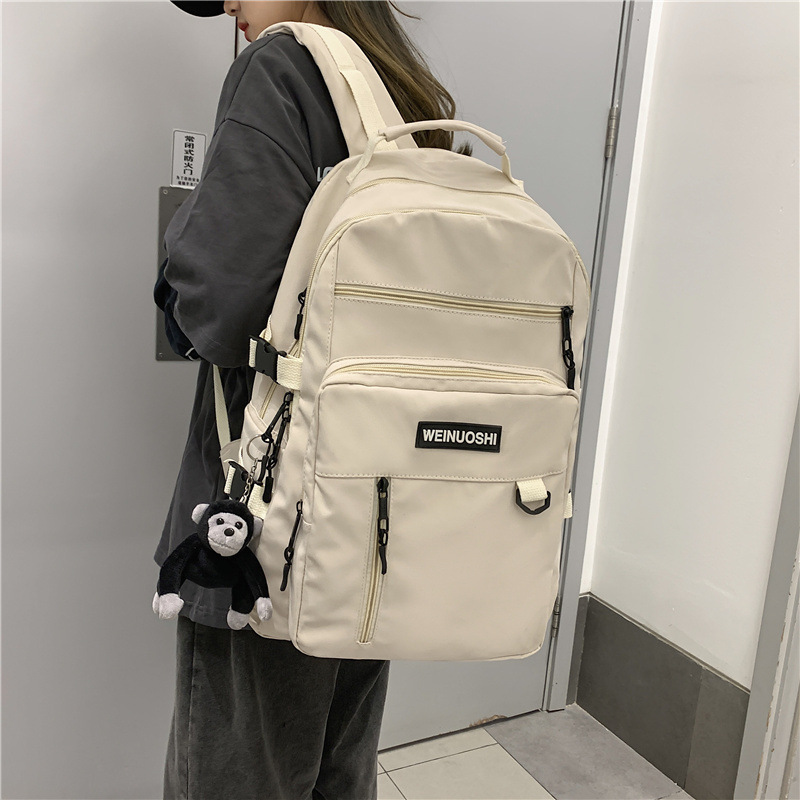 Backpack for male college students, large-capacity backpack for high school and junior high school students, trendy and fashionable couple backpack full figure