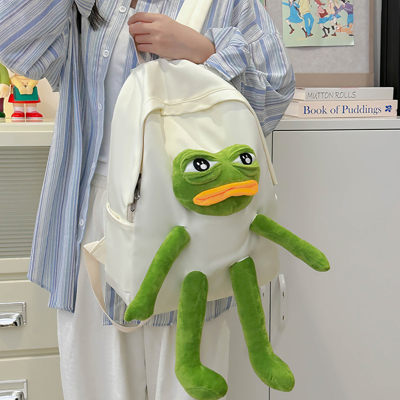 Korean version cute and funny student schoolbag, girl's personality frog doll backpack, large-capacity high school student backpack full figure