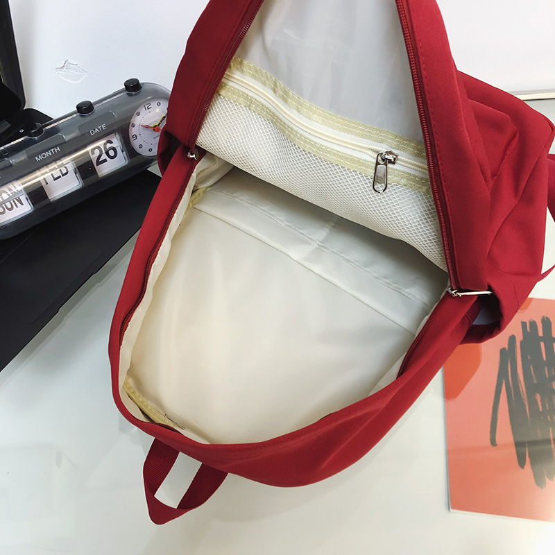 Schoolbag for girls, junior high school, senior high school and college students, solid color simple style backpack, 2023 new Korean version lightweight and niche backpack Application Scenario
