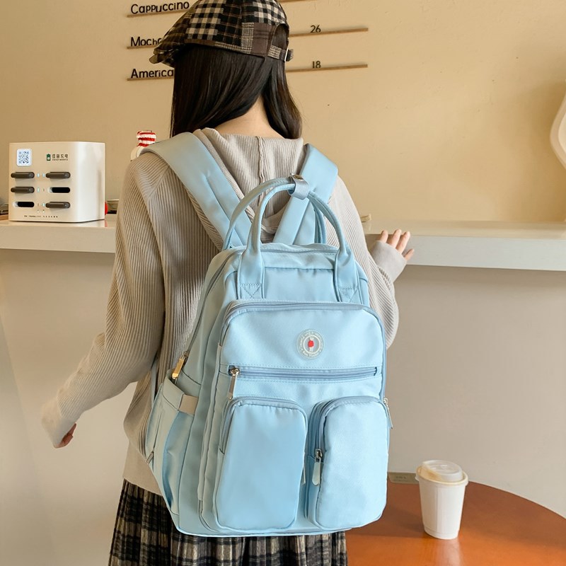 2025 New large-capacity multi-compartment schoolbag for junior and senior high school students, Korean style versatile backpack, casual and simple schoolbag details Picture